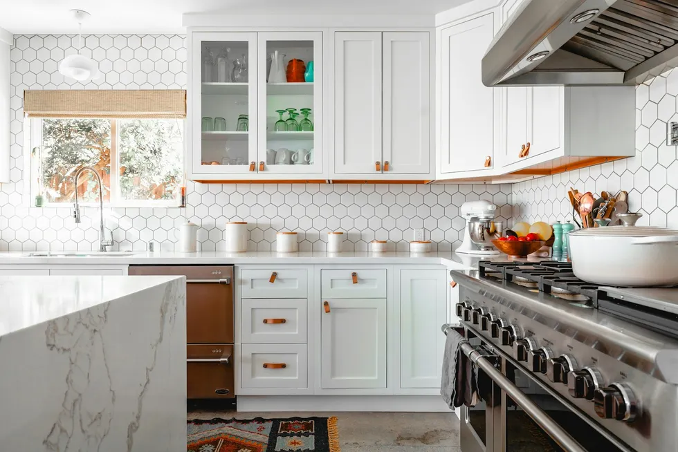 Kitchen with hexagon tile backsplash